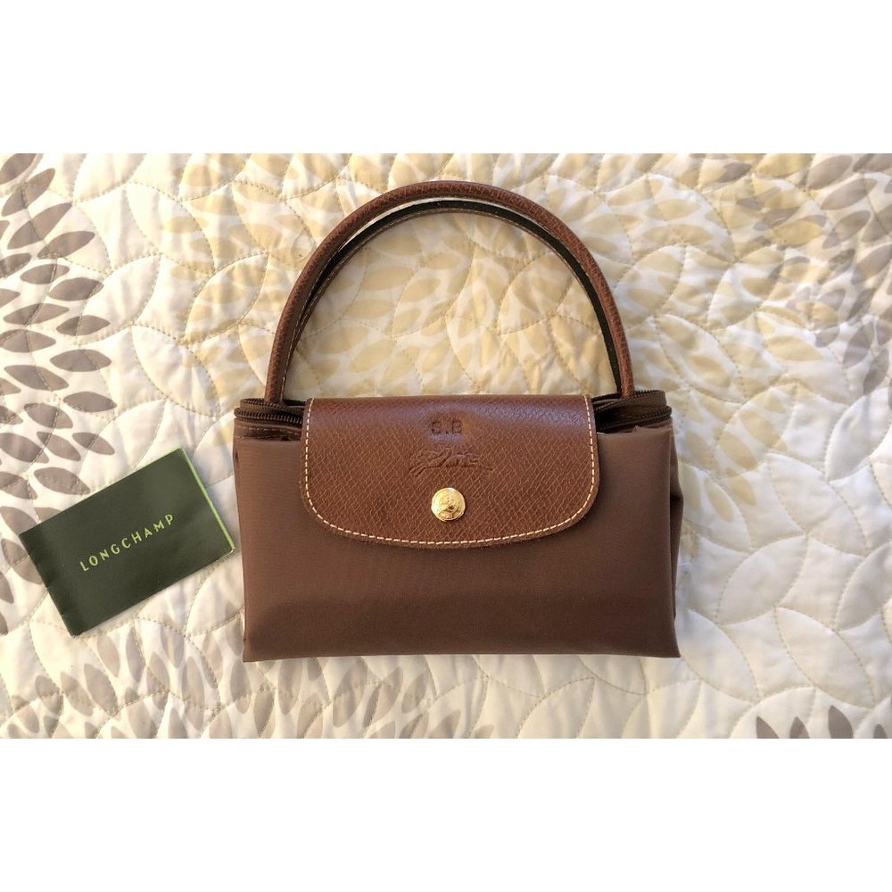 New...Never used..Longchamp Original top handle Small tote. Brown.